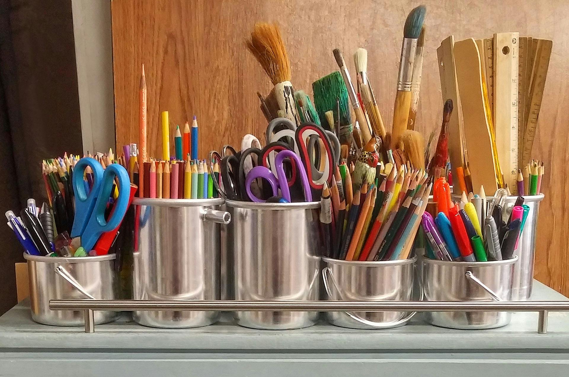 Office supplies including paper, pens, and notebooks