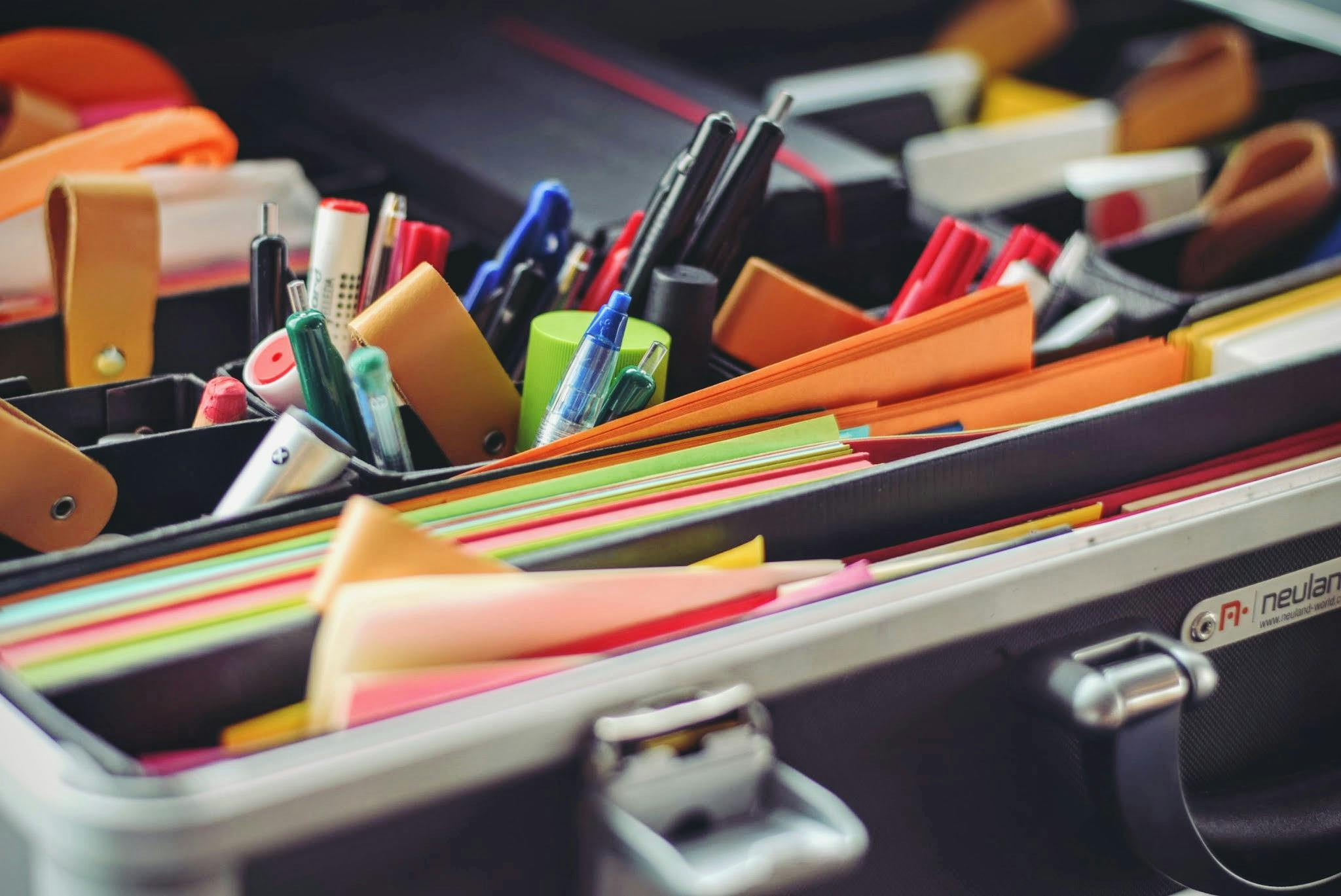 Office consumables including toner cartridges, paper, and office supplies
